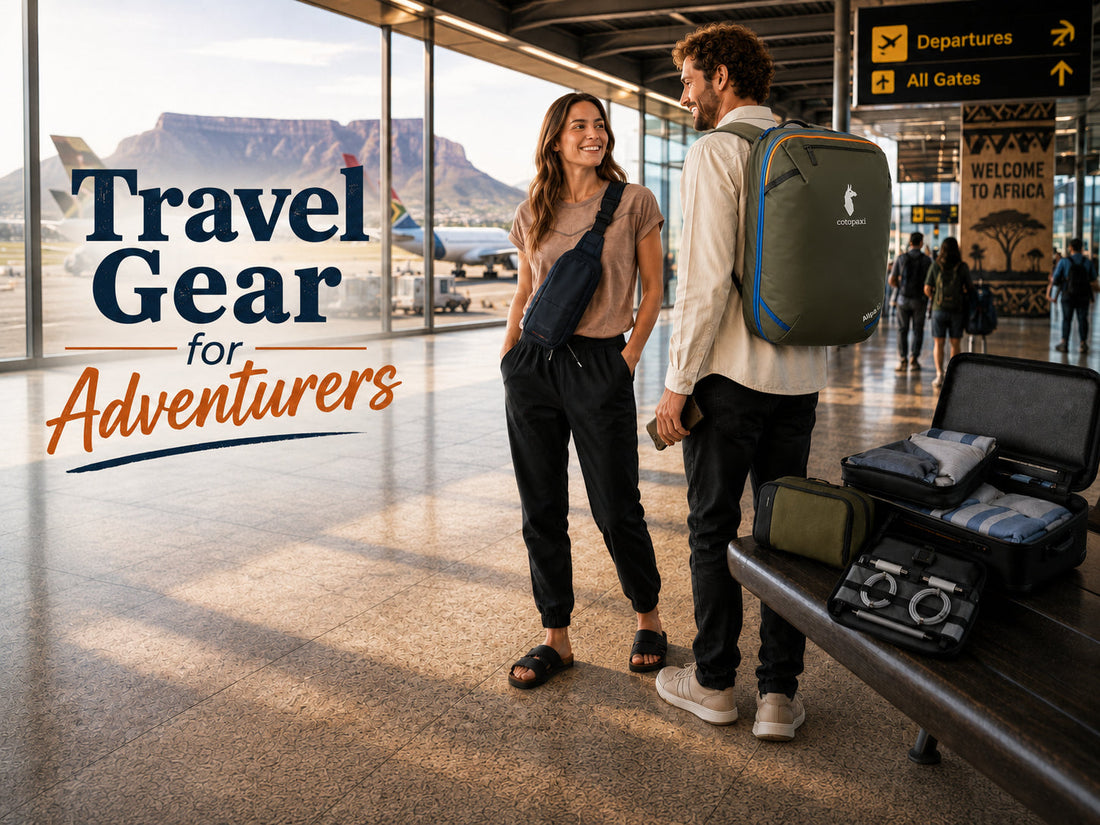 Two travellers with carry-on gear and a Cotopaxi backpack in an airport overlooking Table Mountain, with text reading “Travel Gear for Adventurers