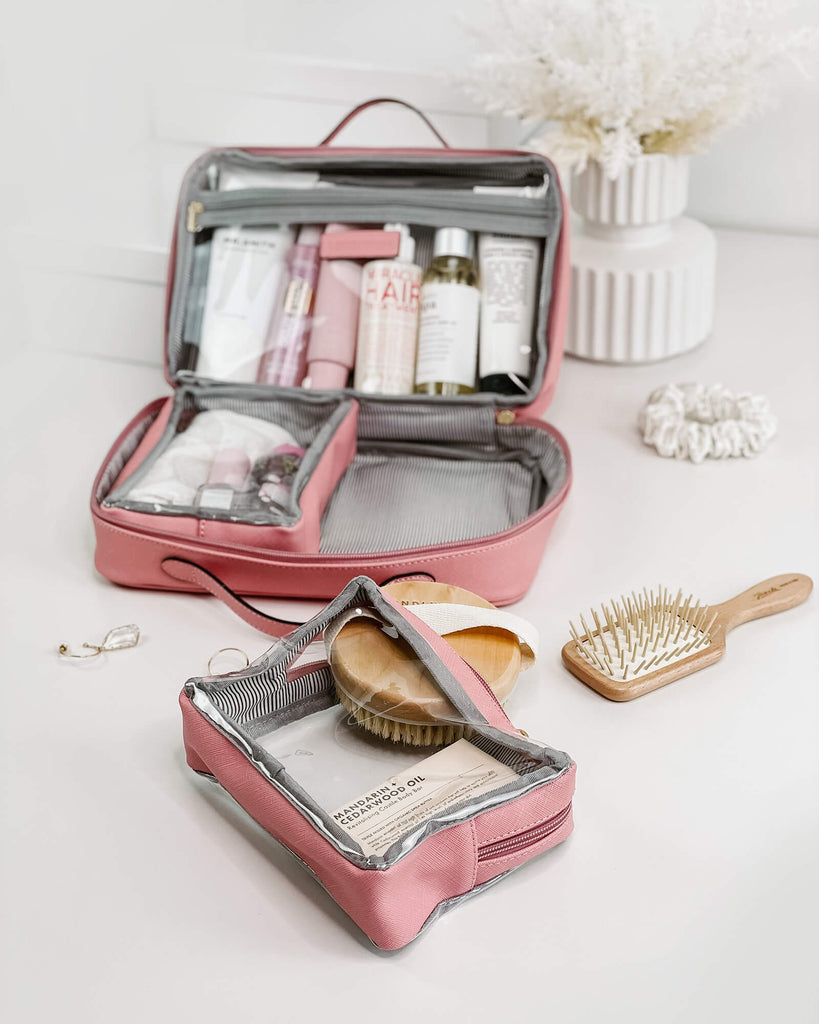 Lindex - Make up with your makeup bag this season and add a little colour  to it. Shop here